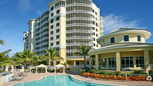 Tropical pool resort with palm trees