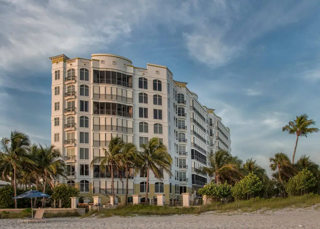 Resort building surrounded by palm trees